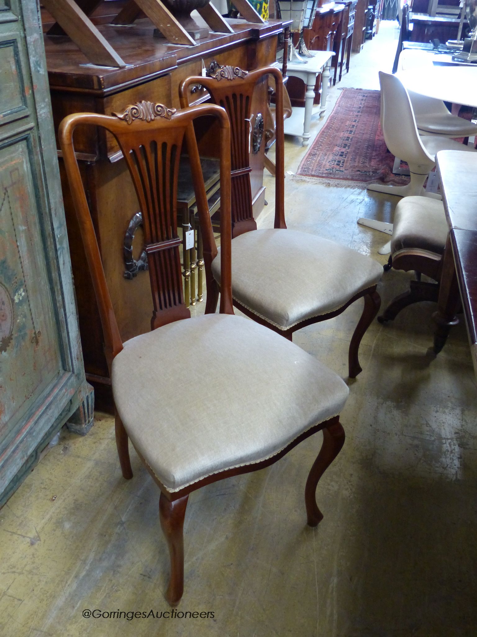 A set of four Edwardian mahogany dining chairs